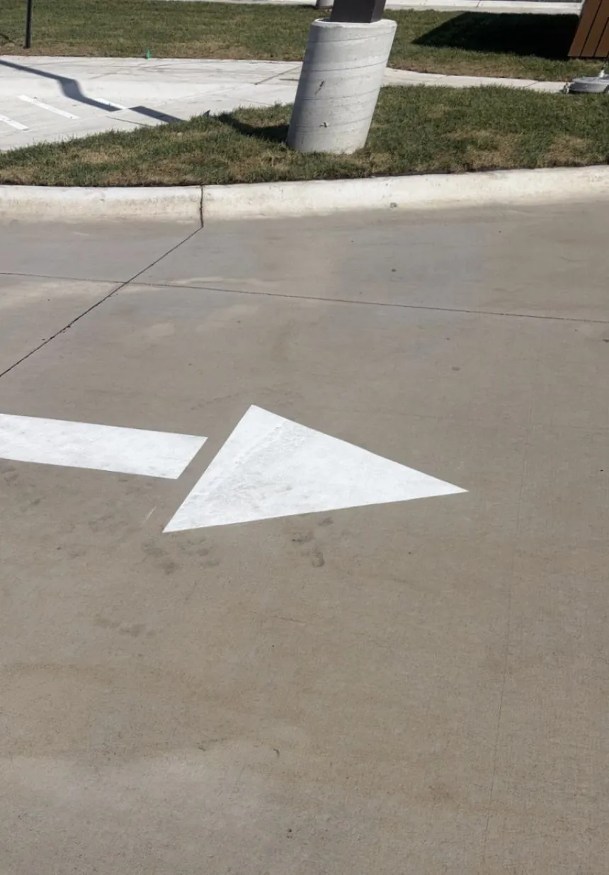 Parking lot concrete after pressure washing